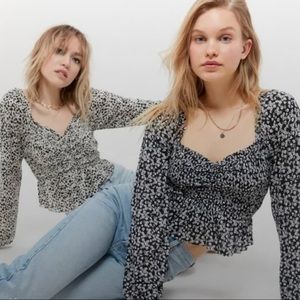 Super cute black and white floral long sleeve top